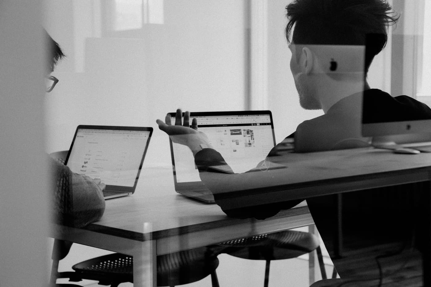 Development team discussing project strategy in a modern office
